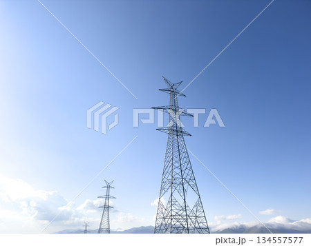 Power line. High-voltage power transmission tower with wires. High voltage line. Energy industry. Energy transfer over blue sky. Energy industry. Power substation. 134557577