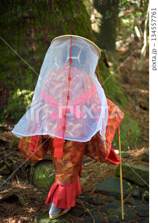 Japanese woman wearing traditional Heian Period costume at the Kumano Kodo Pilgrimage Route in Wakayama prefecture of Japan Japanese woman wearing traditional Heian Period costume at the Kumano Kodo Pilgrimage Route in Wakayama prefecture of Japan 134557761