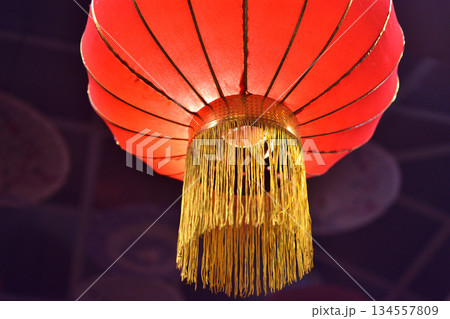 Red Chinese Lantern with Golden Tassels Red Chinese Lantern with Golden Tassels 134557809
