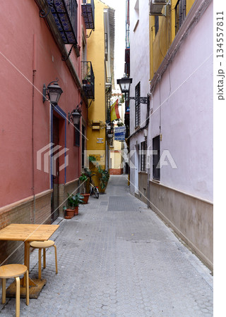 Narrow streets of Casco Antiguo historic Old town city centre district of the capital of Andalusia, Seville, Spain 134557811