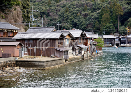 Traditional wooden fishermen Funaya boathouses in Ine, north Kyoto prefecture on the Sea of Japan 134558025