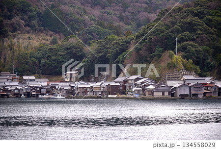 Traditional wooden fishermen Funaya boathouses in Ine, north Kyoto prefecture on the Sea of Japan 134558029