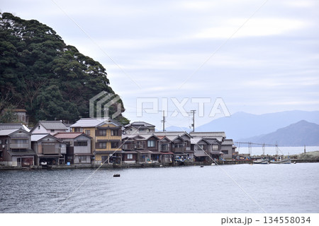Traditional wooden fishermen Funaya boathouses in Ine, north Kyoto prefecture on the Sea of Japan 134558034