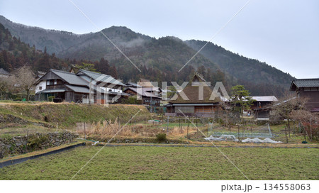 Traditional thatched roof houses of Miyama village in Kyoto Prefecture in Japan Traditional thatched roof houses of Miyama village in Kyoto Prefecture in Japan 134558063