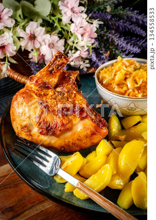 A delicious piece of roasted chicken. 134558533