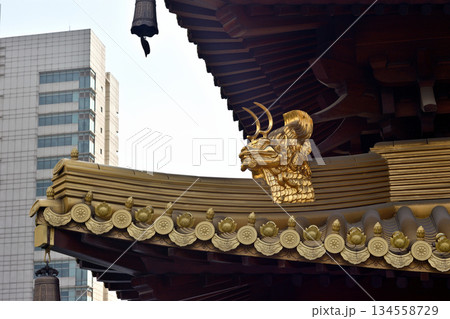 Historic Buddhist temple complex of Jingan Temple on the West Nanjing Road in downtown Shanghai, China Historic Buddhist temple complex of Jingan Temple on the West Nanjing Road in downtown Shanghai, China 134558729