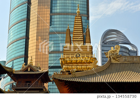 Historic Buddhist temple complex of Jingan Temple on the West Nanjing Road in downtown Shanghai, China Historic Buddhist temple complex of Jingan Temple on the West Nanjing Road in downtown Shanghai, China 134558730