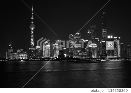 Cityscape night view across Huangpu River of Oriental Pearl Tower and Pudong new area in Shanghai, China 134558869