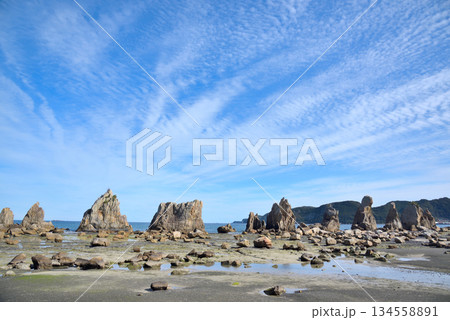 Hashigui Rocks natural stone formations in Kushimoto Town in Kii Peninsula in Wakayama, Japan Hashigui Rocks natural stone formations in Kushimoto Town in Kii Peninsula in Wakayama, Japan 134558891