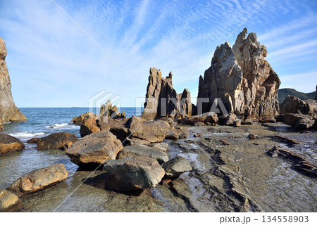 Hashigui Rocks natural stone formations in Kushimoto Town in Kii Peninsula in Wakayama, Japan 134558903