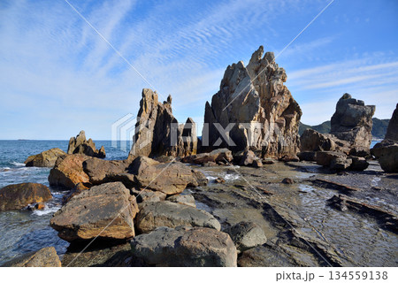 Hashigui Rocks natural stone formations in Kushimoto Town in Kii Peninsula in Wakayama, Japan Hashigui Rocks natural stone formations in Kushimoto Town in Kii Peninsula in Wakayama, Japan 134559138