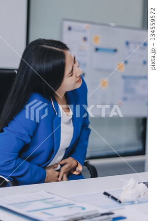 Asian women Aches from working She felt like relaxing Asian women Aches from working She felt like relaxing 134559572