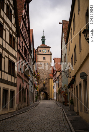 Medieval street with Markusturm tower in Rothenburg ob der Tauber old town 134559842