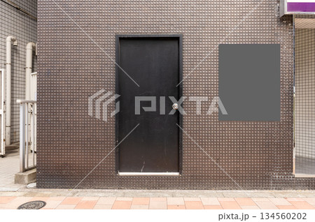 sidewalk by street wall and door sidewalk by street wall and door 134560202