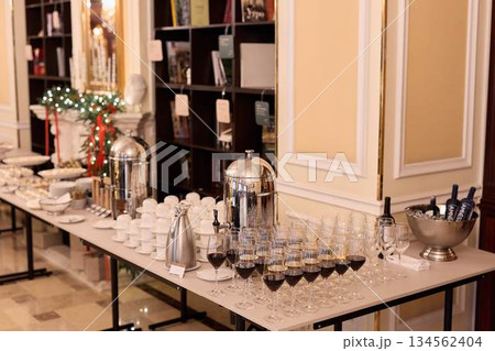 Elegant Coffee Arrangement, Stylish Coffee Station Accompanied By Contemporary Cups And Plates Elegant Coffee Arrangement, Stylish Coffee Station Accompanied By Contemporary Cups And Plates 134562404