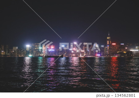 Hong Kong Victoria Harbour illuminated with dazzling night skyline 134562801