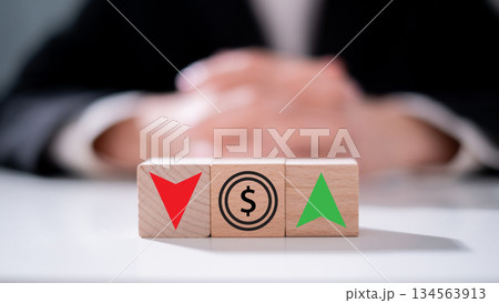 Income debt interest percent inflation with increase and decrease icon on wooden block finance business economy investment concept 134563913