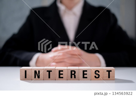 Interest rate on wooden block in business financial debt risk investment economy Interest rate on wooden block in business financial debt risk investment economy 134563922