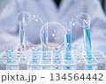 Laboratory research science chemistry blue liquid test tube with icon 134564442
