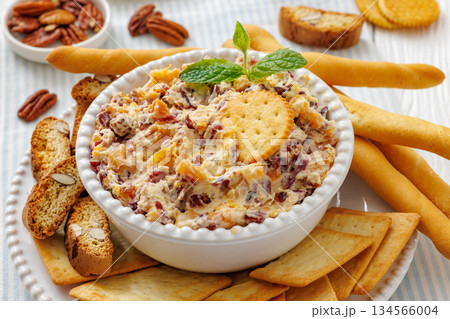 cranberry apricot cheese spread in a bowl 134566004