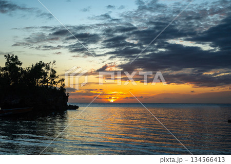 Sunset on Lia beach, Waleakodi Island, Togian archipelago, Sulawesi, Indonesia Sunset on Lia beach, Waleakodi Island, Togian archipelago, Sulawesi, Indonesia 134566413