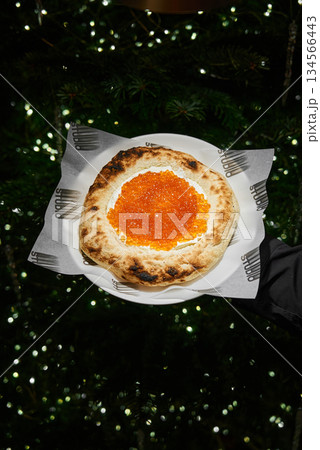 Nighttime Culinary Display Showcasing Crust And Roe With Moody Lighting And Attentive Service Nighttime Culinary Display Showcasing Crust And Roe With Moody Lighting And Attentive Service 134566443