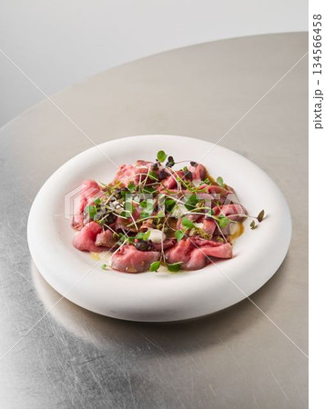 plant forward beet gnocchi with microgreens, menu highlight plant forward beet gnocchi with microgreens, menu highlight 134566458