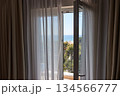 Apartment with sea view, open balcony door 134566777