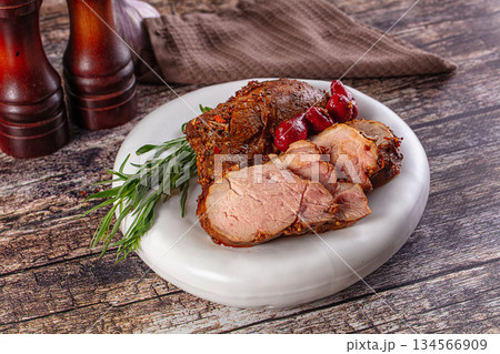 Baked pork sirloin with cornus 134566909