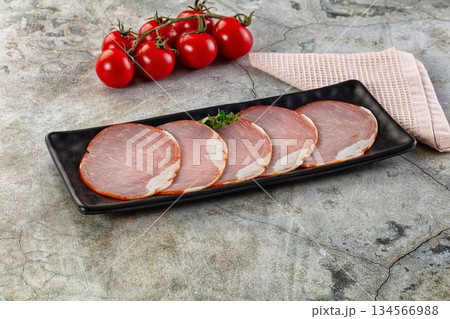 Cured dry pork meat slices 134566988