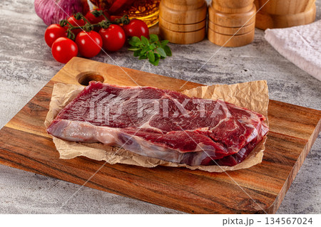 Gourmet raw rib eye steak 134567024