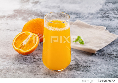 Fresh orange juice in the glass 134567072