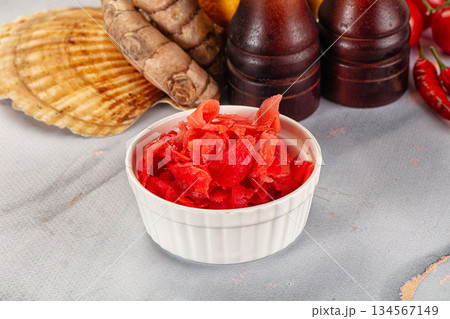 Pickled red ginger in the bowl 134567149