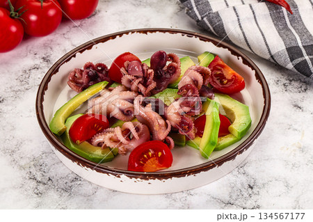 Salad with baby octopus and avocado 134567177