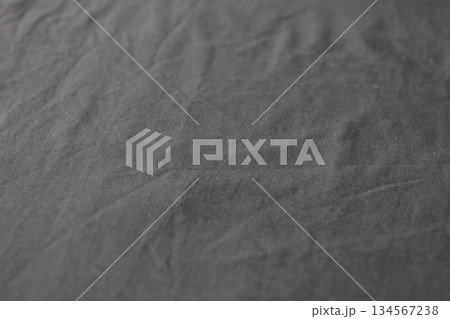 Dark Gray Wrinkled Fabric Texture Background Close Up 134567238
