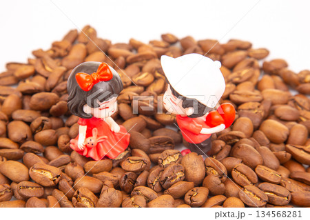 miniature figures of people among roasted coffee beans.  people relations concept 134568281