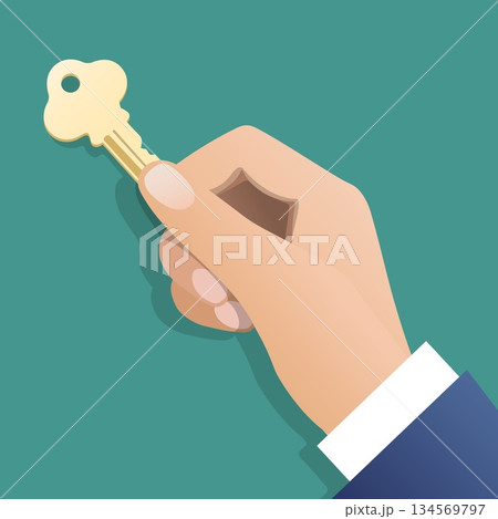 Human hand holds key 134569797