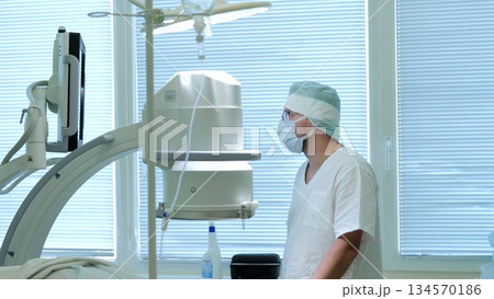 Russia Tomsk 05.07.2025: Medical team ensures imaging device is precisely aligned and functioning properly, Healthcare professionals verify safety and accuracy during imaging system Russia Tomsk 05.07.2025: Medical team ensures imaging device is precisely aligned and functioning properly, Healthcare professionals verify safety and accuracy during imaging system 134570186