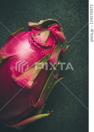Dragon fruit, pitahaya, one piece, top view, rustic style, green background, Dragon fruit, pitahaya, one piece, top view, rustic style, green background, 134570973
