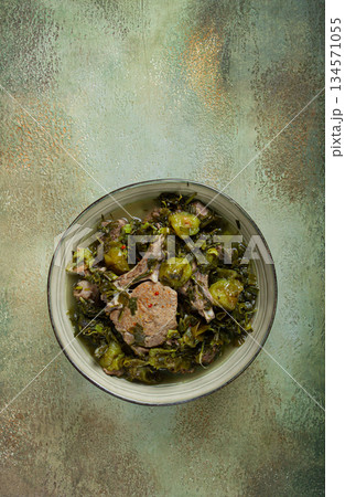 chakapuli, Georgian dish, stewed meat with herbs and tkemali, in white wine, homemade, no people, 134571055