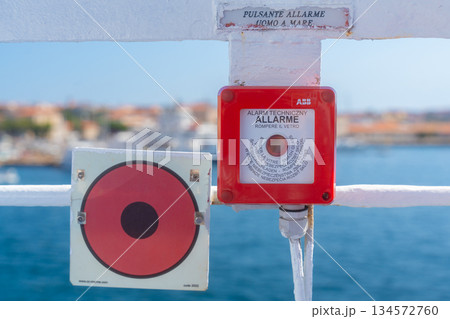 Emergency alarm and safety equipment mounted on passenger ferry. Maritime safety and transportation concept Emergency alarm and safety equipment mounted on passenger ferry. Maritime safety and transportation concept 134572760
