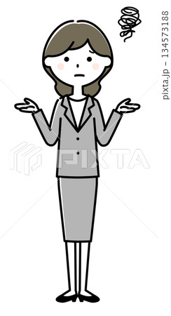 困っているスーツの女性 134573188