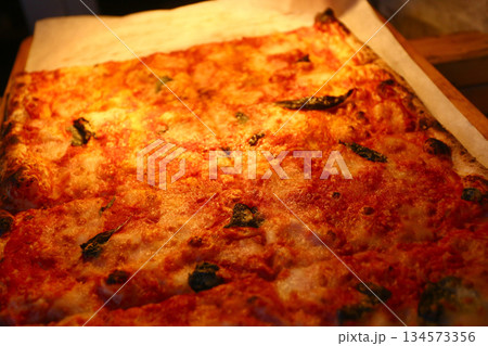 cheese and tomato pizzas as italian food 134573356
