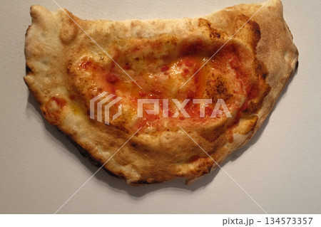 cheese and tomato pizzas as italian food 134573357