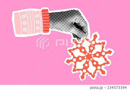 Halftone vector hand holding a snowflake, fun winter collage for posters and invitations 134573394