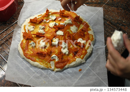 cheese and tomato pizzas as italian food 134573448