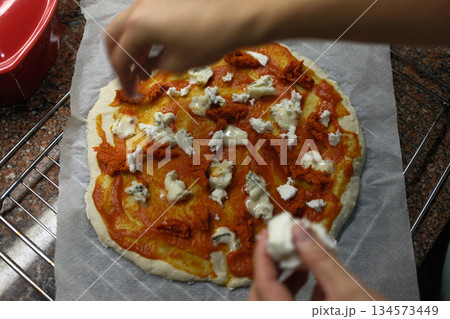 cheese and tomato pizzas as italian food 134573449