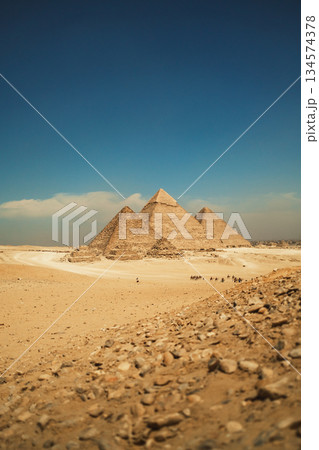 Timeless Landscape with the Great Pyramids Under Blue Sky 134574378