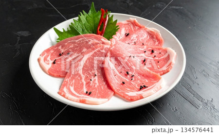 Pork slices on the plate for the shabu Pork slices on the plate for the shabu 134576441