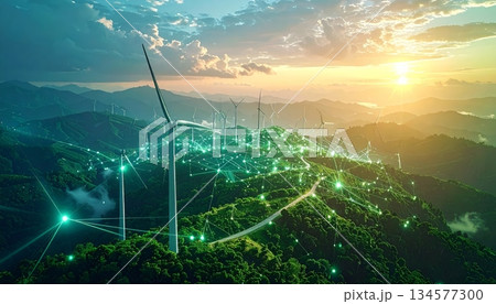 Renewable energy wind turbines generate green power across a scenic landscape of mountains and grassy fields under a blue sky as a sustainable farm technology for a clean environment Renewable energy wind turbines generate green power across a scenic landscape of mountains and grassy fields under a blue sky as a sustainable farm technology for a clean environment 134577300